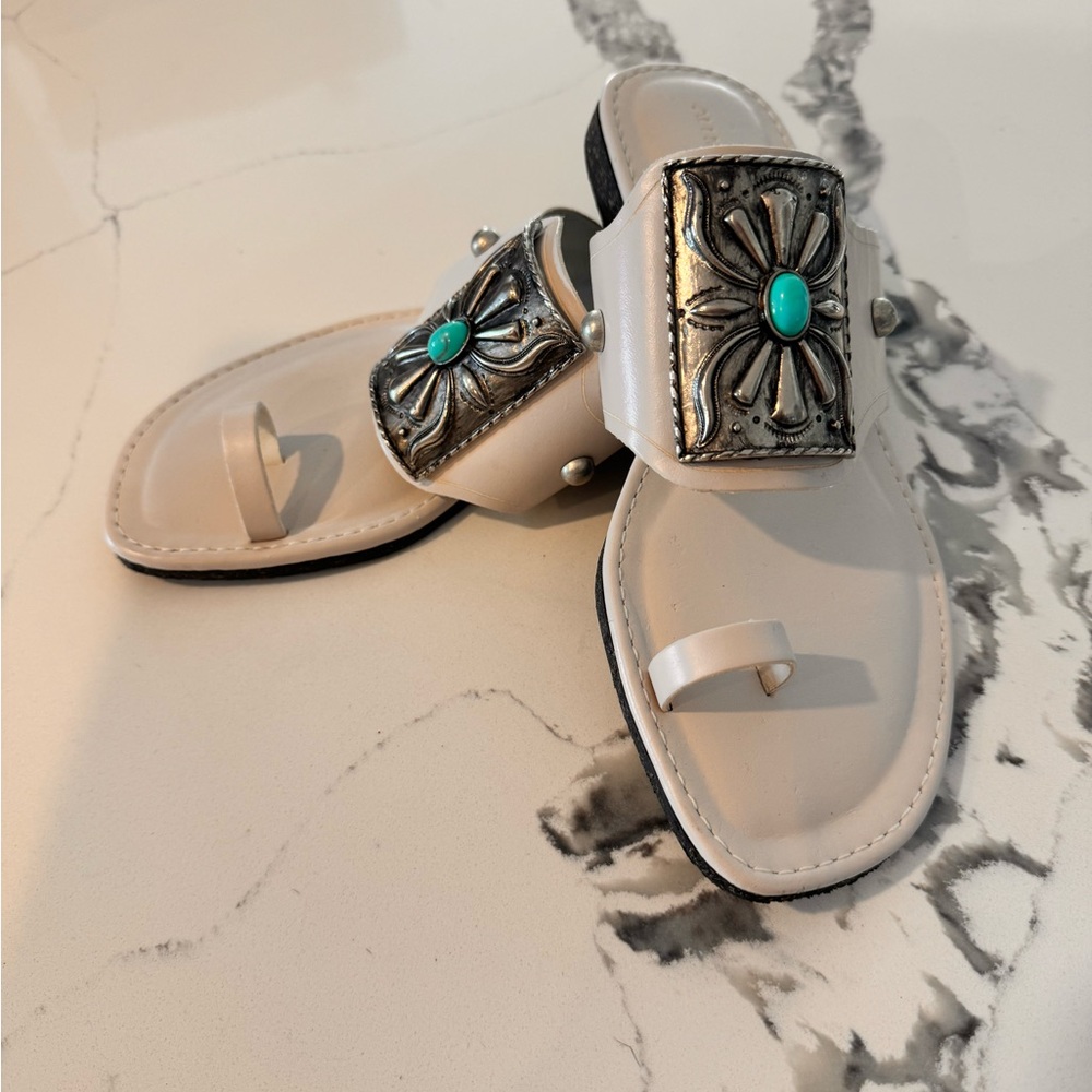 Stylish sandals- faux turquoise decor only used a couple of times.